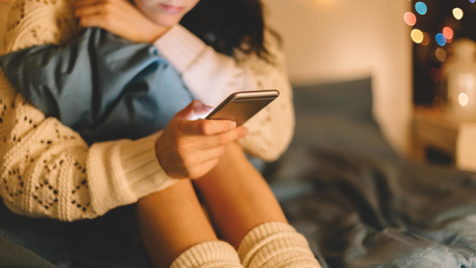 In bed on phone In bed on phone