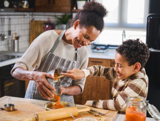 Mother and son baking healthy meal