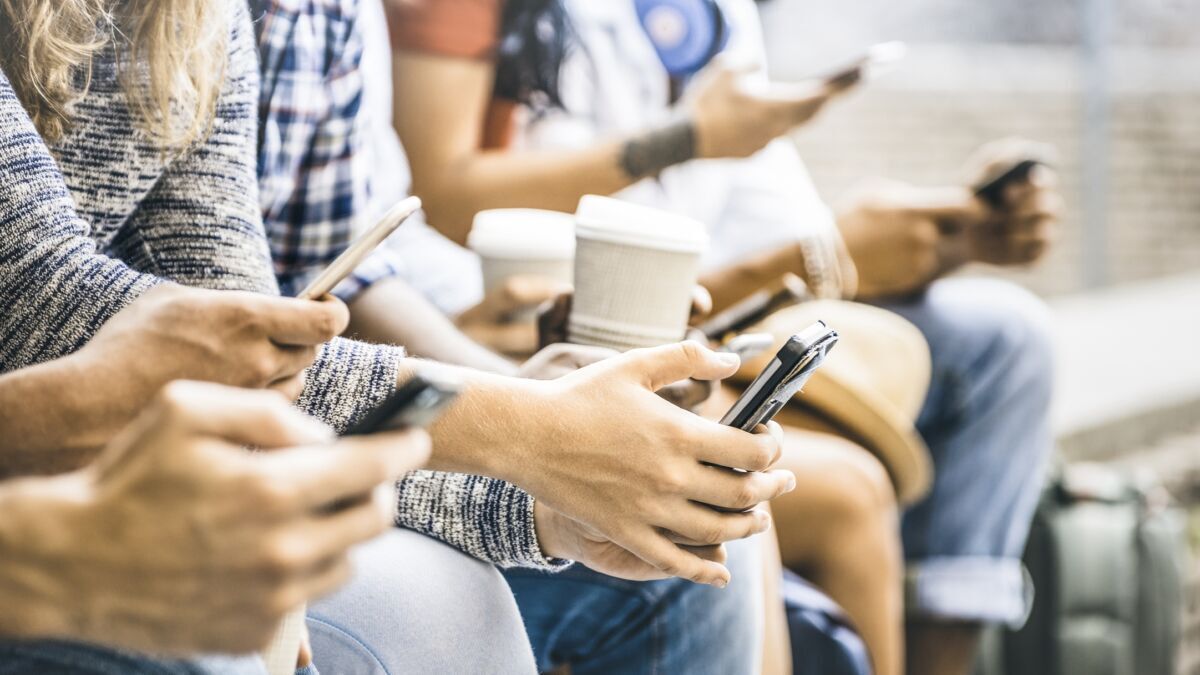 People Looking at Cell Phones