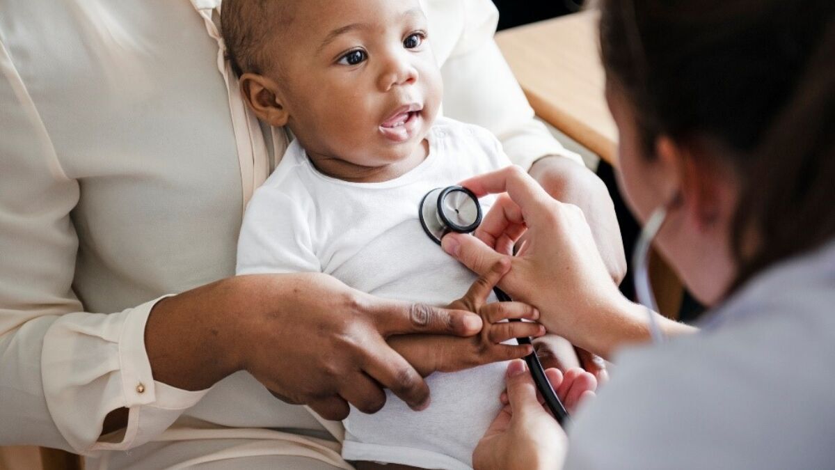 Baby getting a physical exam