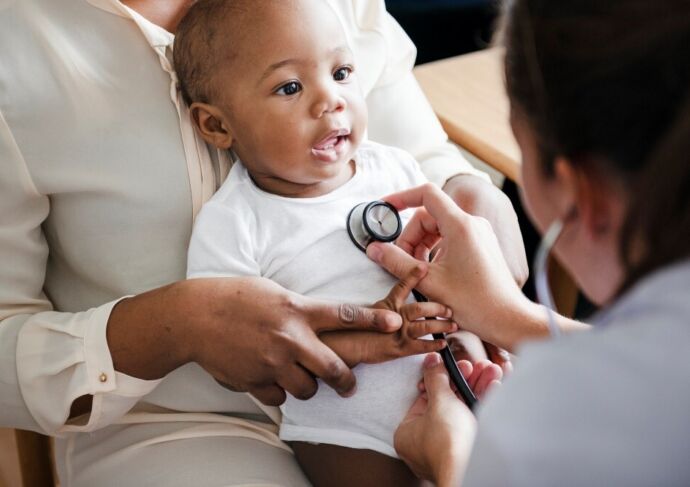 Baby getting a physical exam