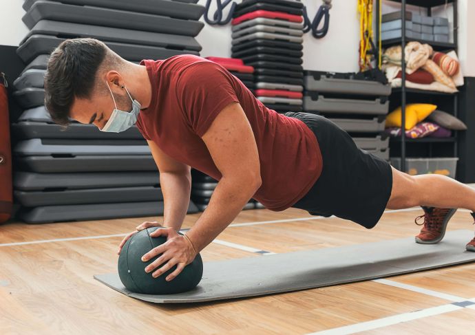 Young man doing planks