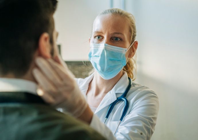 Doctor examining patient 2