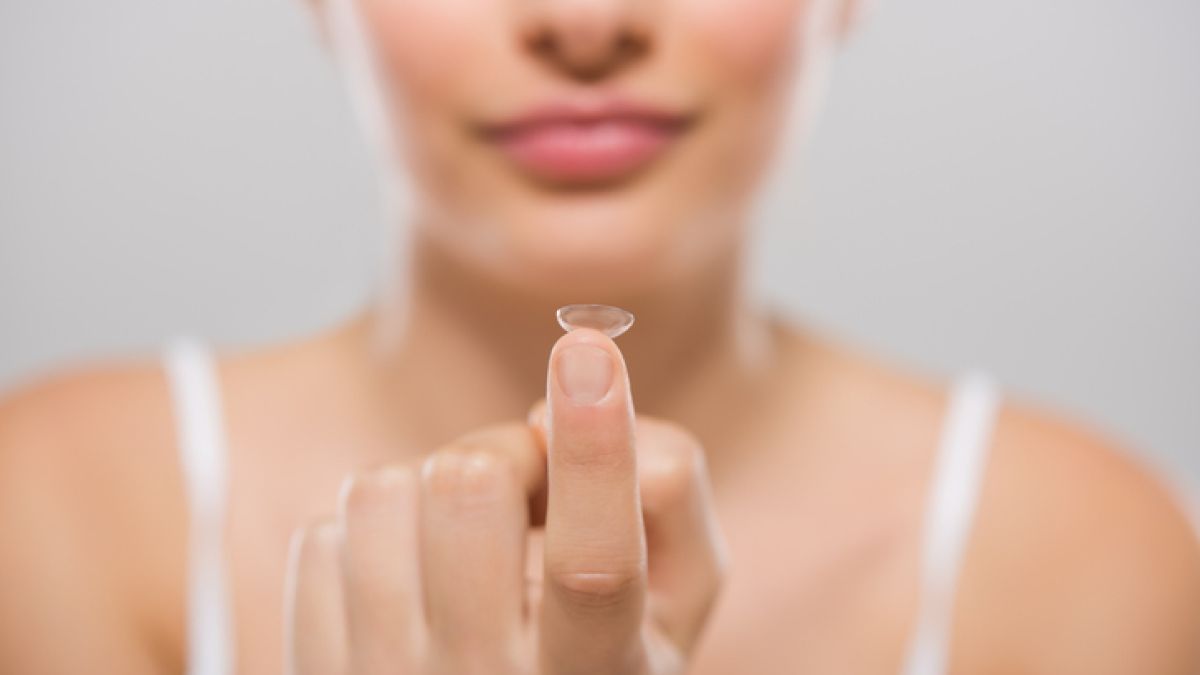 Woman with Contact Lens