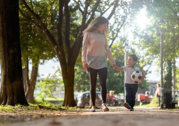 Mom Holding Sons Hand