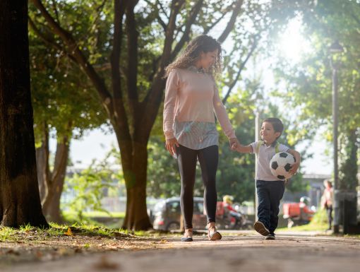 Mom Holding Sons Hand