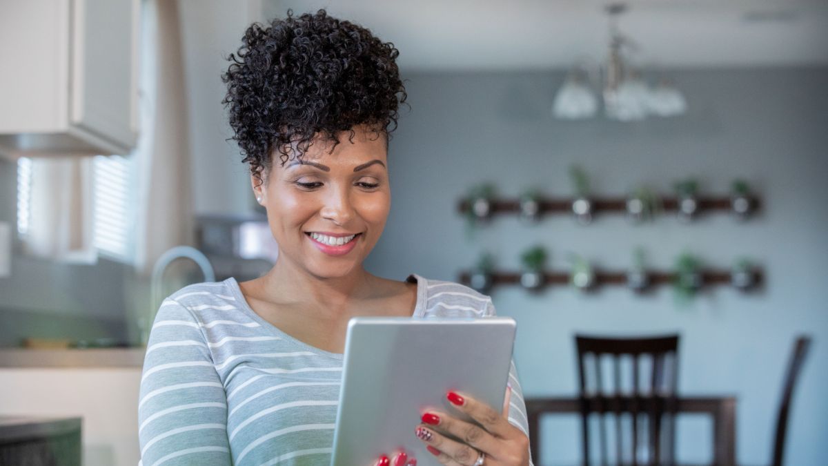 Telehealth female patient on her tablet during a virutal visit.