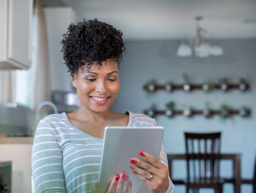 Telehealth female patient on her tablet during a virutal visit.