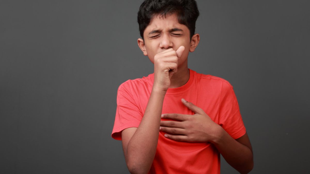 Boy coughing