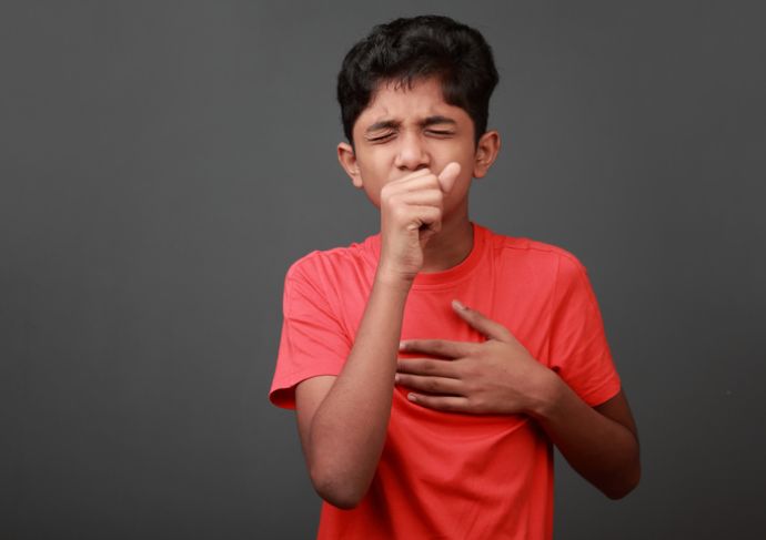 Boy coughing