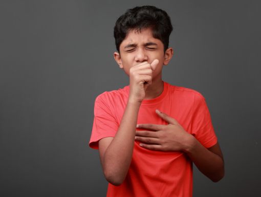 Boy coughing