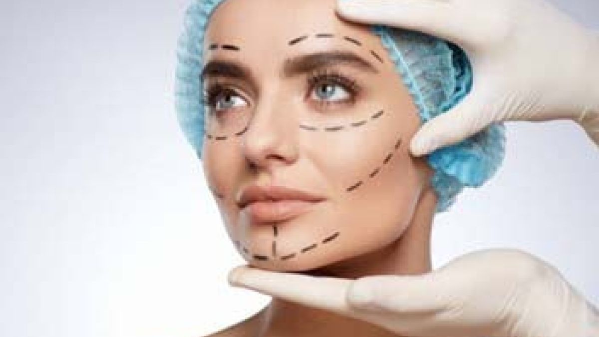 Woman wearing surgical cap getting ready for blepharoplasty surgery