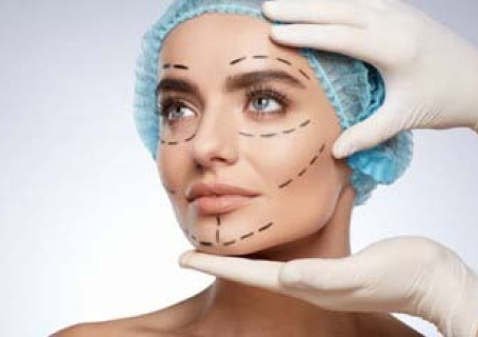 Woman wearing surgical cap getting ready for blepharoplasty surgery