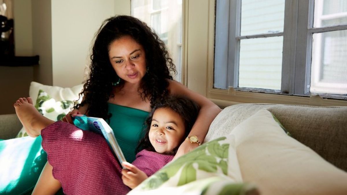 Mother daughter on couch
