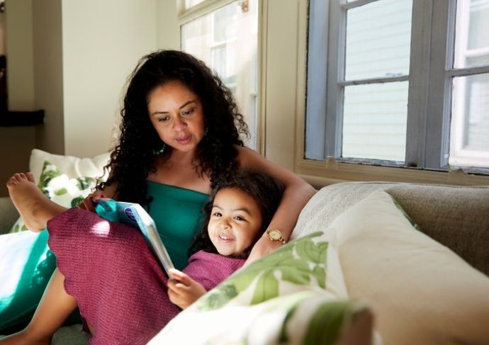 Mother daughter on couch