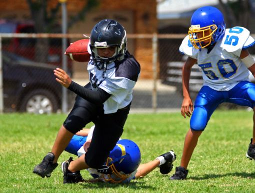 Kids playing football