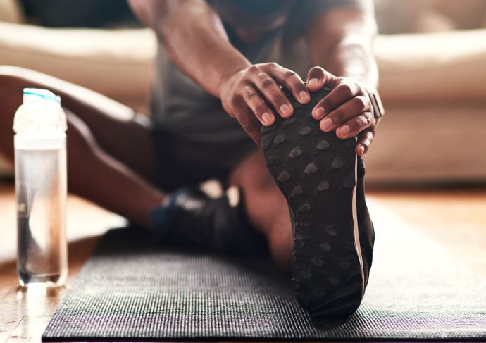 Men stretching and exercising