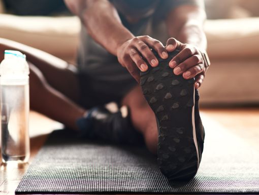 Men stretching and exercising
