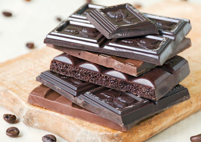Dark Chocolate bars stacked on cutting board for Valentine's Day treat