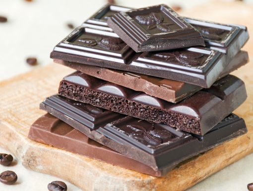 Dark Chocolate bars stacked on cutting board for Valentine's Day treat