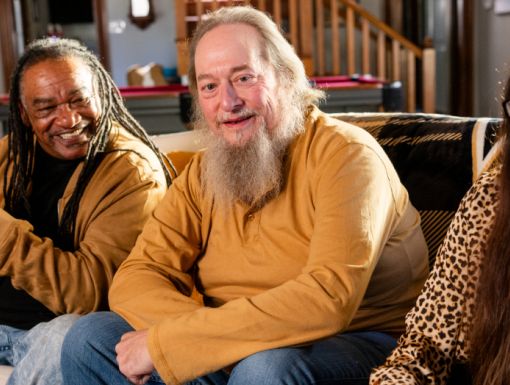 People sitting on a sofa