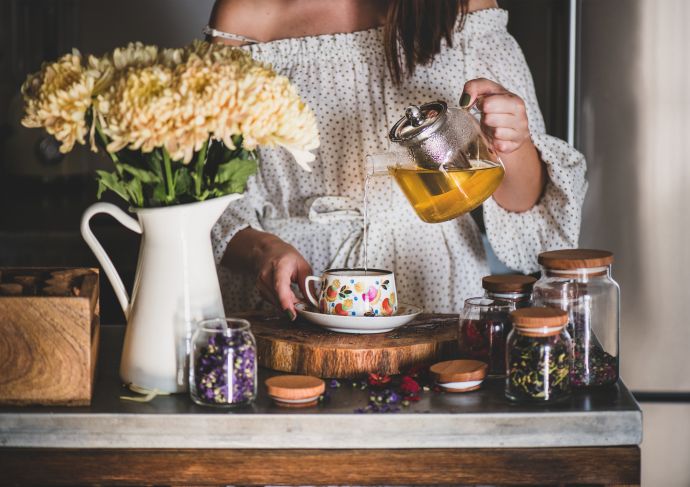 Girl brewing loose leaf tea