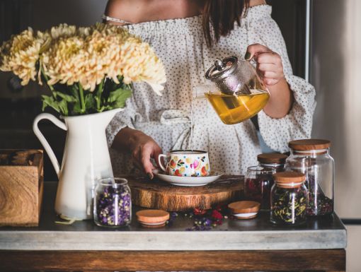 Girl brewing loose leaf tea