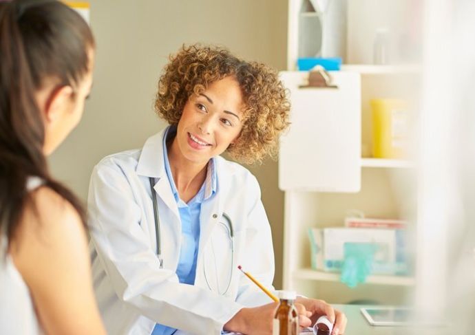 Doctor talking with patient