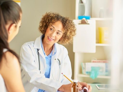 Doctor talking with patient
