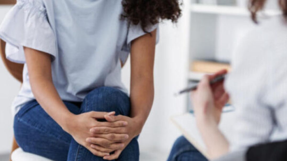 Girl talking with her provider