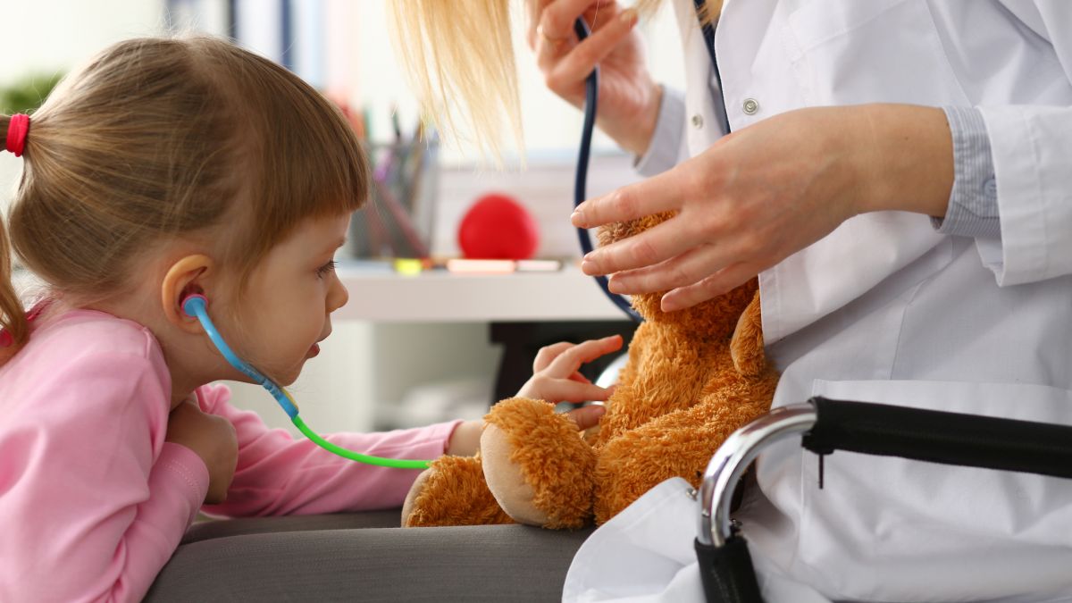 Child practicing on bear