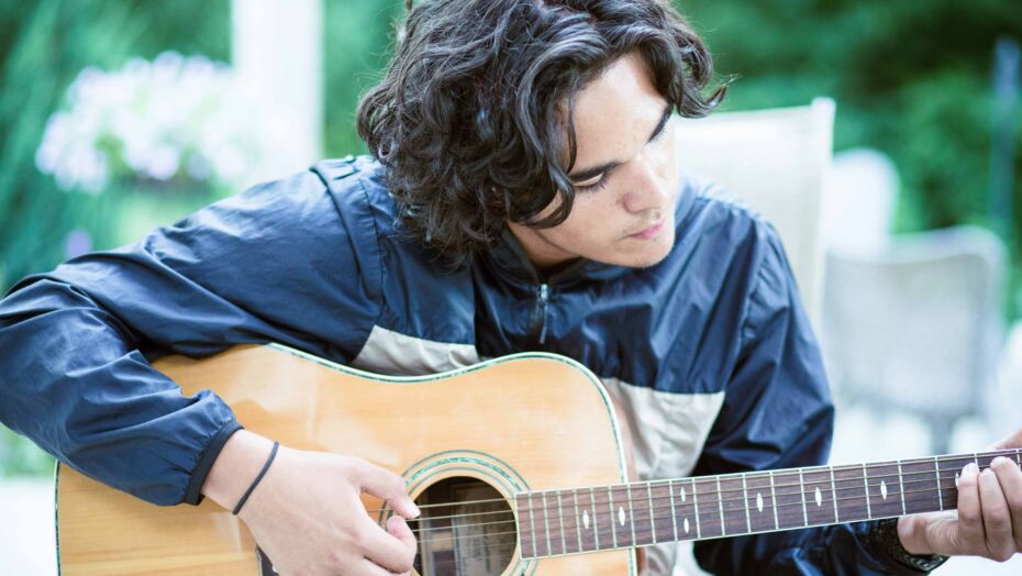 Young man playing guitar