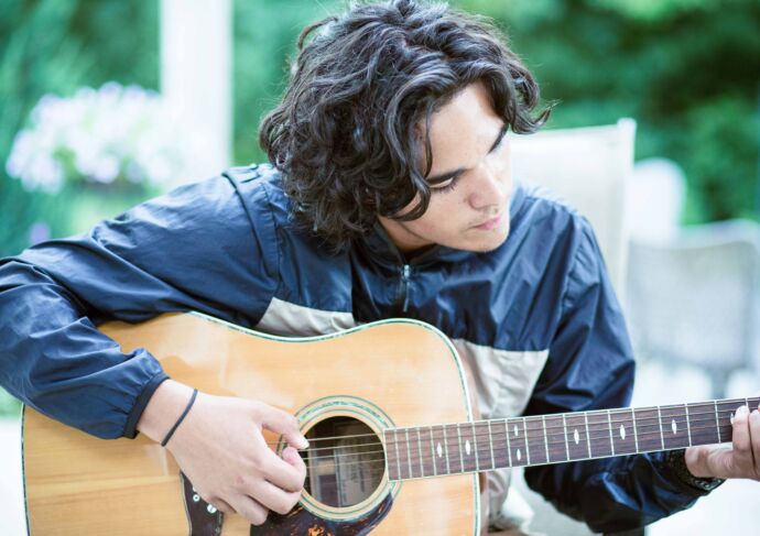 Young man playing guitar