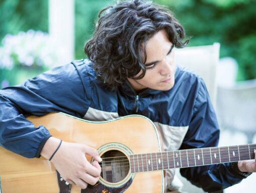 Young man playing guitar