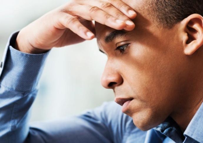 Man holding his head