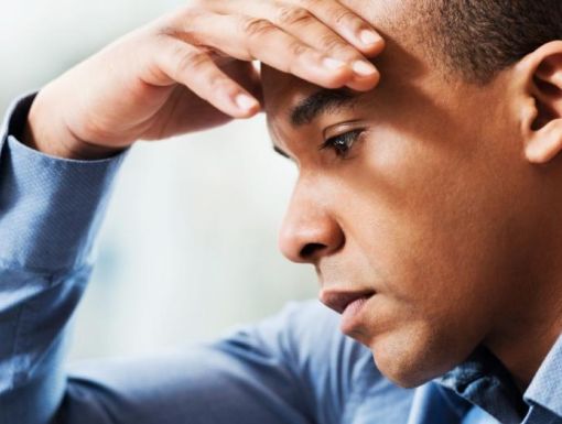 Man holding his head