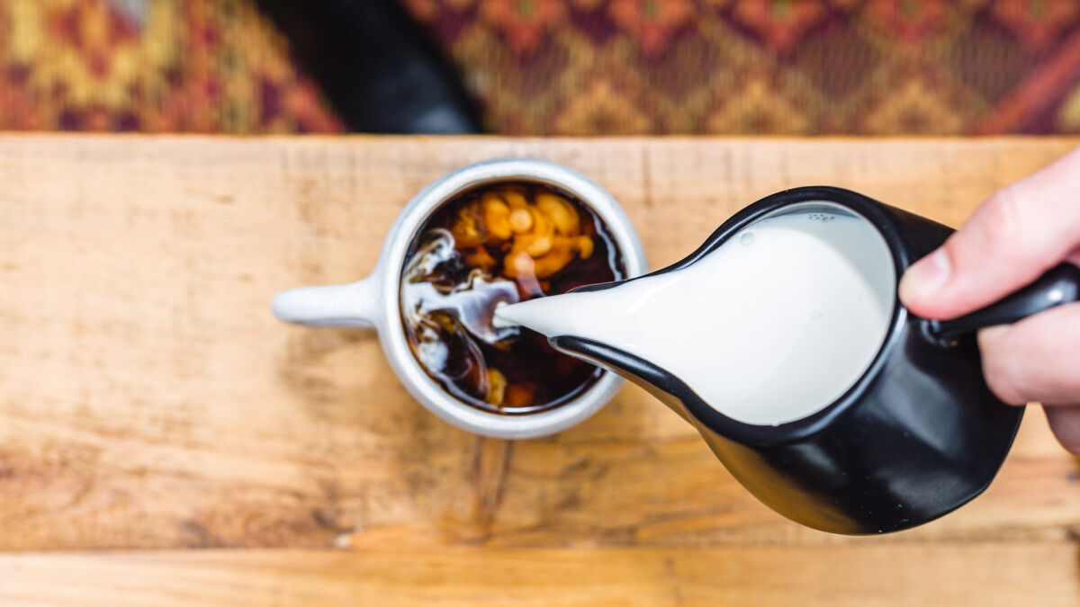 Plant Based Creamer poured in coffee