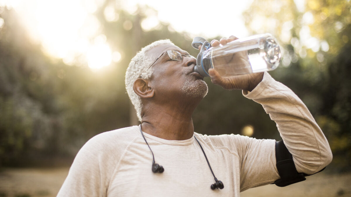 Hydration tips man drinking water