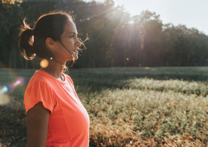 Woman getting sunshine in the morning