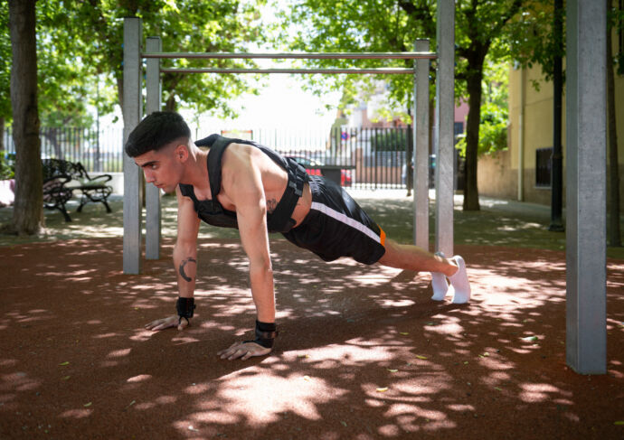 Man wearing weighted vest to exercise
