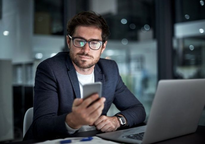 Man researching on his cell phone