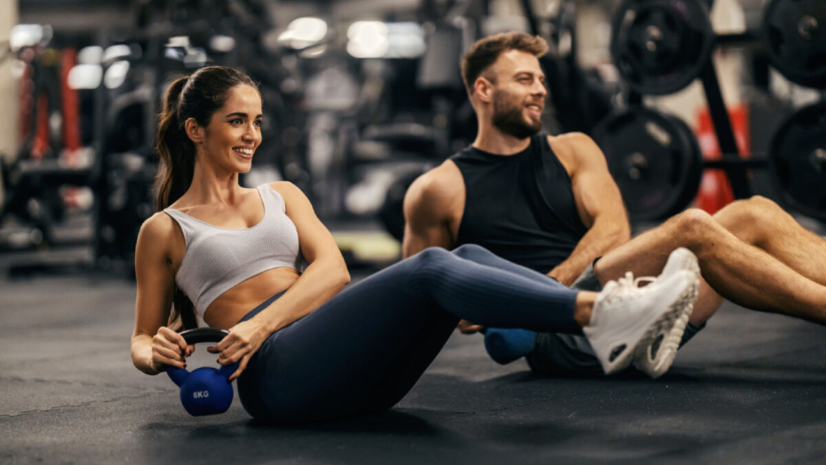 Man and woman working out in a gym