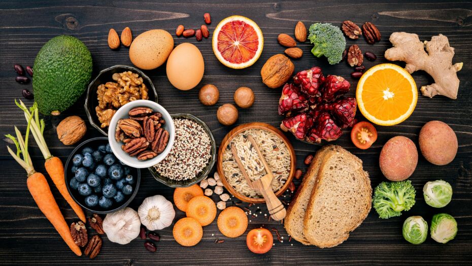 Array of high fiber foods set up on wooden background