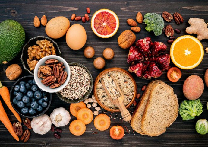 Array of high fiber foods set up on wooden background