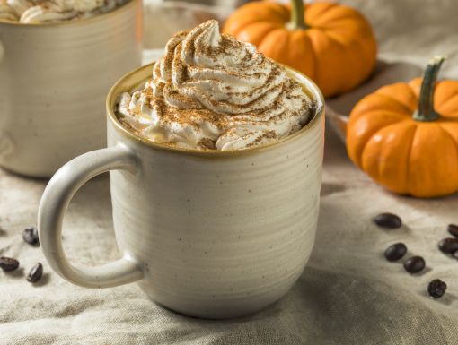 Pumpkin spice latte with fall decor