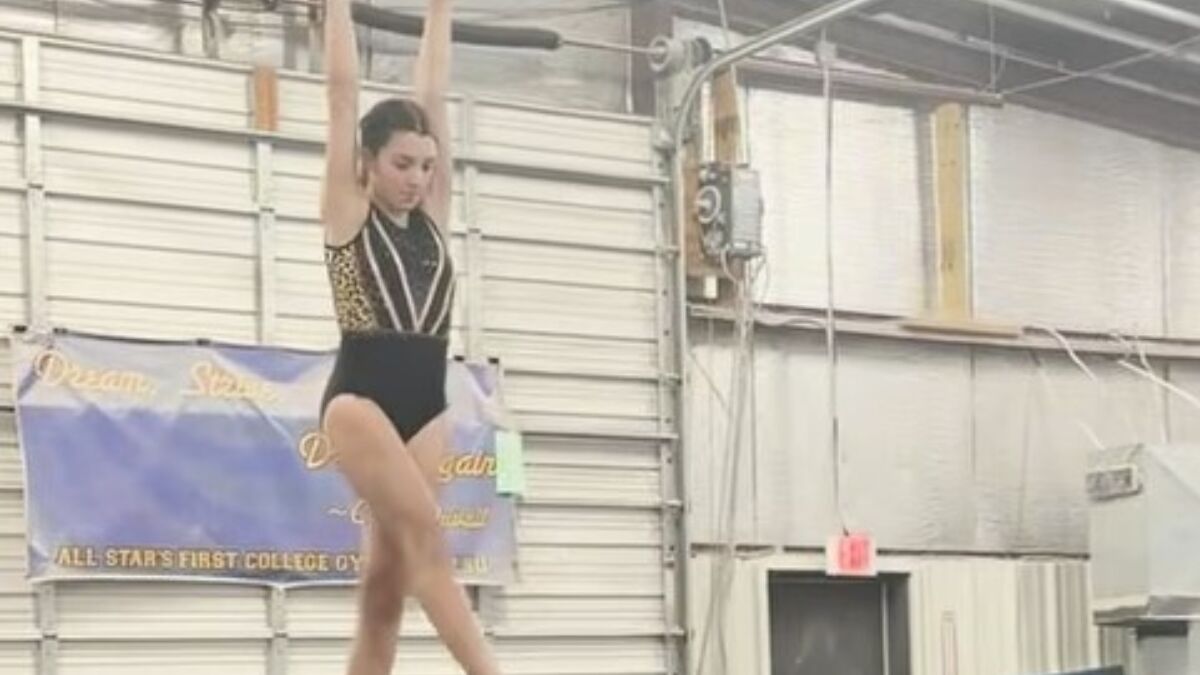 Gymnast bella b on balance beam