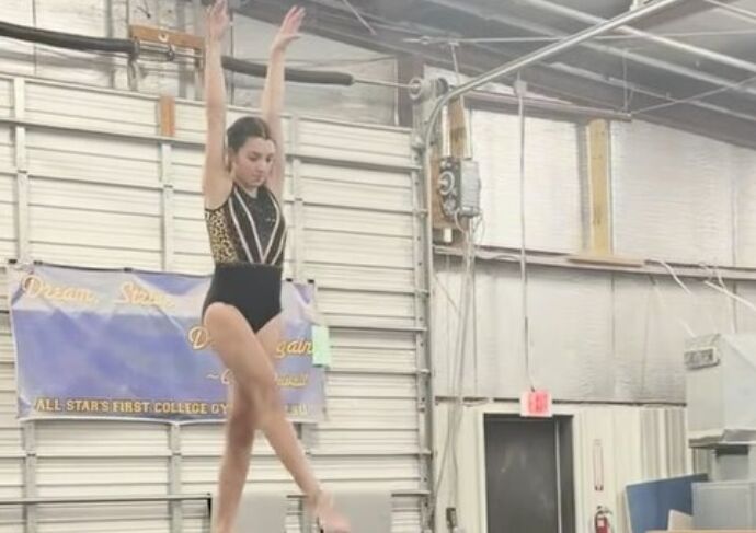 Gymnast bella b on balance beam
