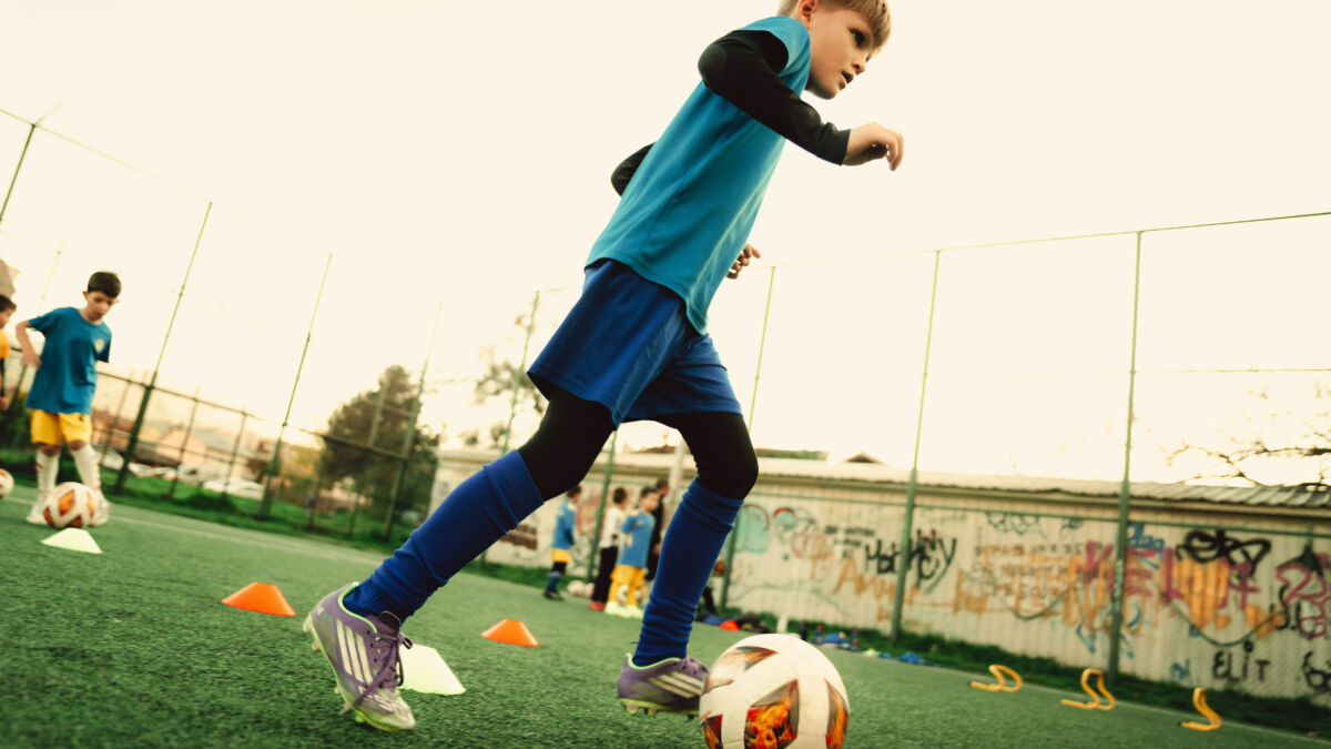 Boy playing soccer