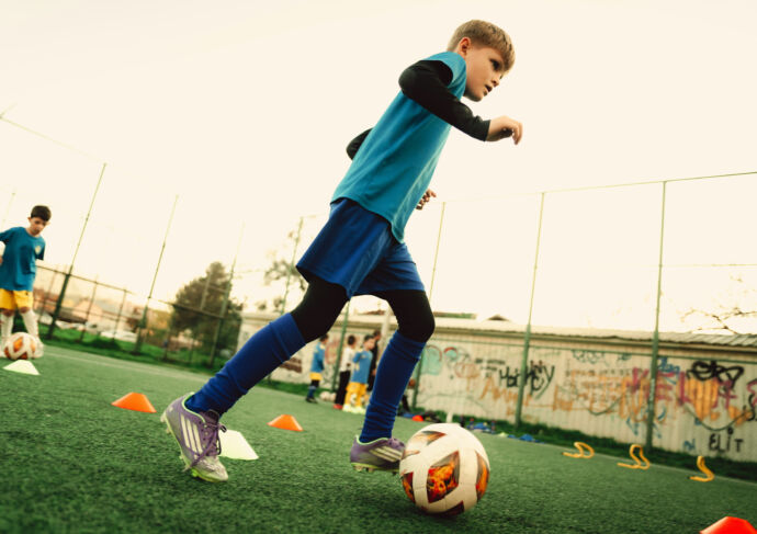 Boy playing soccer