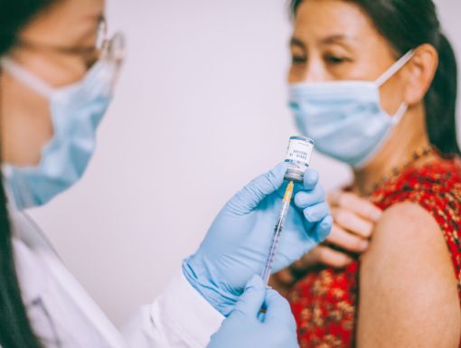 Woman gettin covid shot